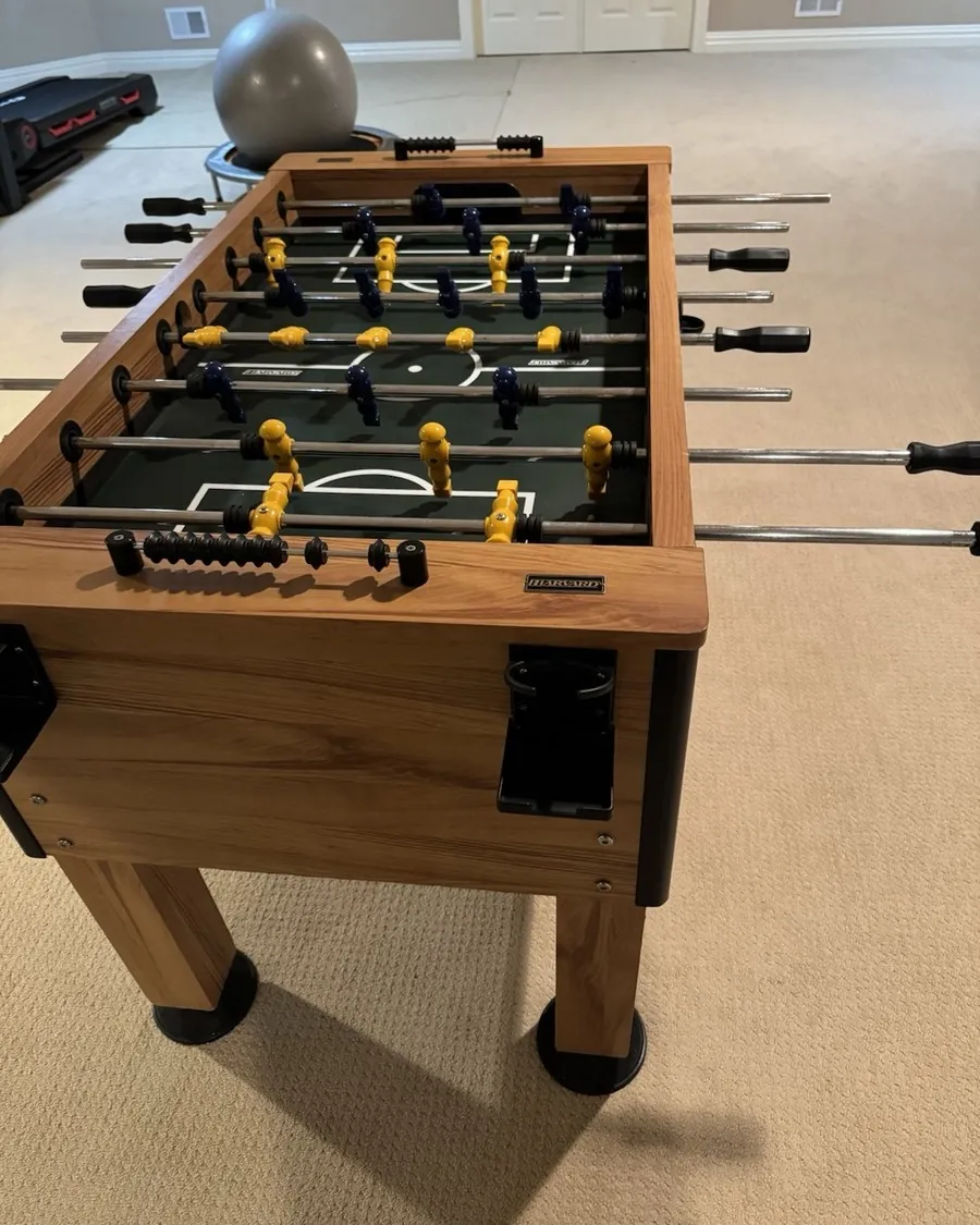 Heavyweight Madstick Pro foosball table displayed in a spacious game room