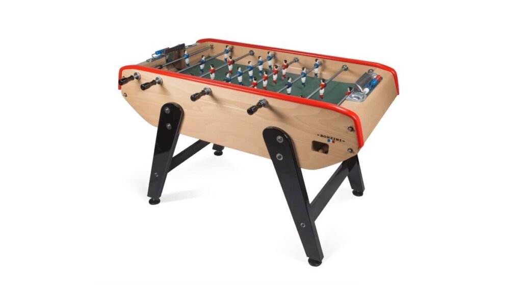 A high-quality Bonzini foosball table sits elegantly in a bright, modern home setting.