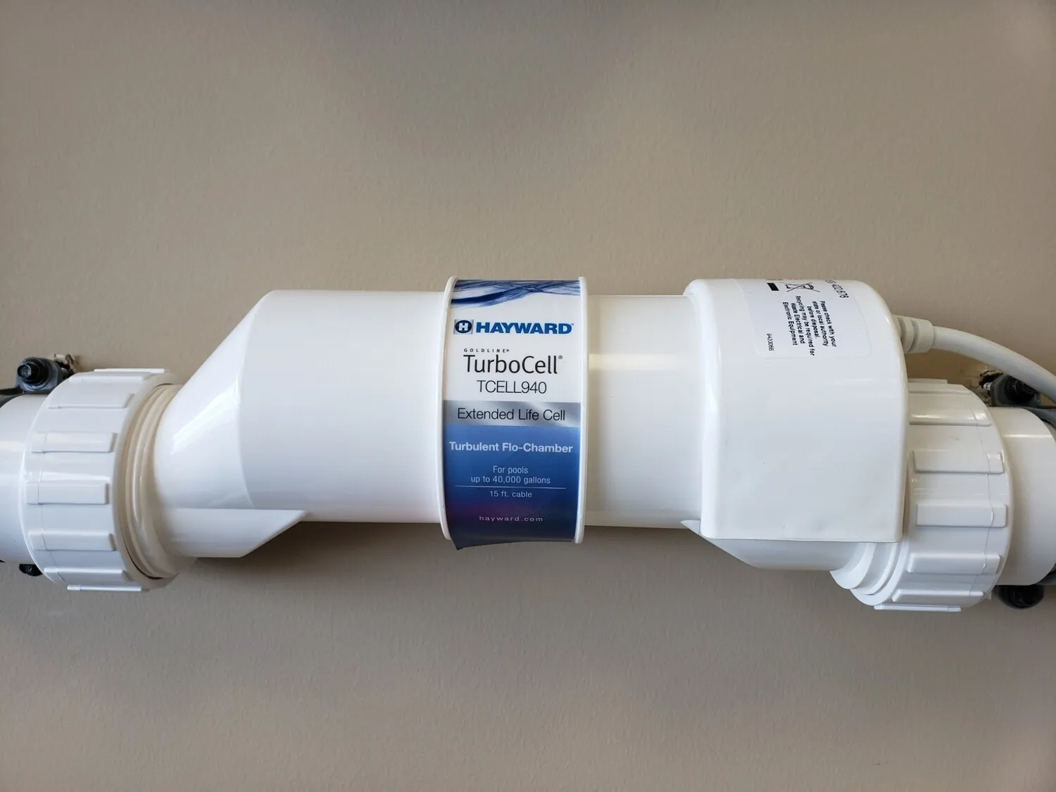 Magnifying glass rests on certification papers as a researcher verifies air filter standards.