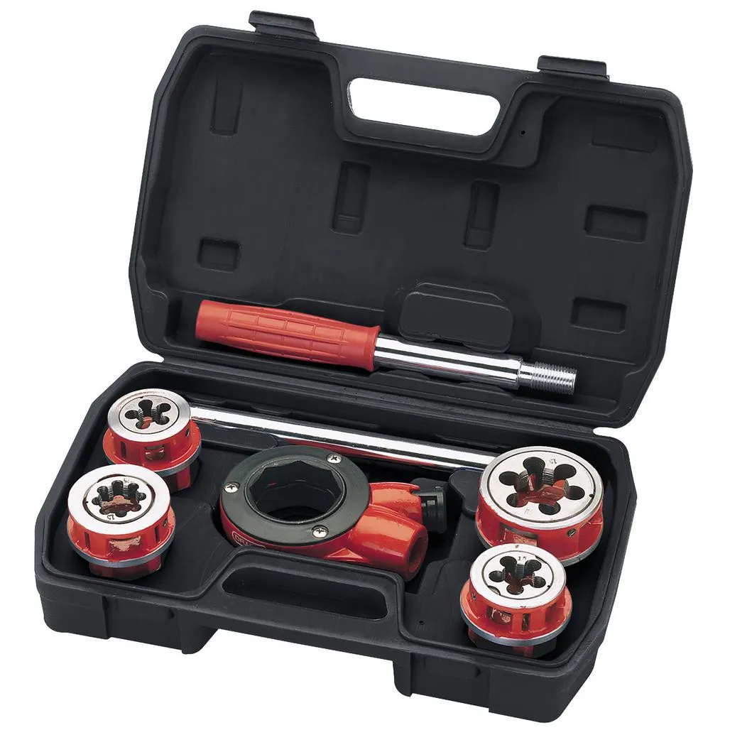 A manual ratchet pipe threader placed next to a modern handheld power threading tool.