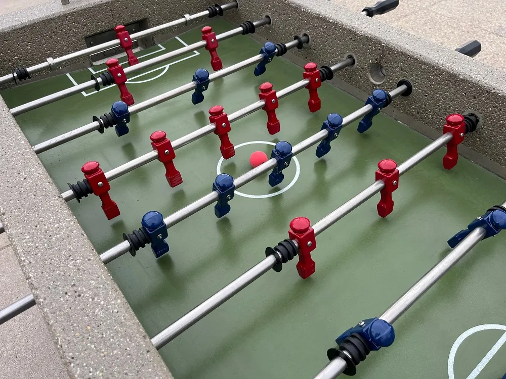 Measuring foosball handle knobs and rods to ensure correct fit.