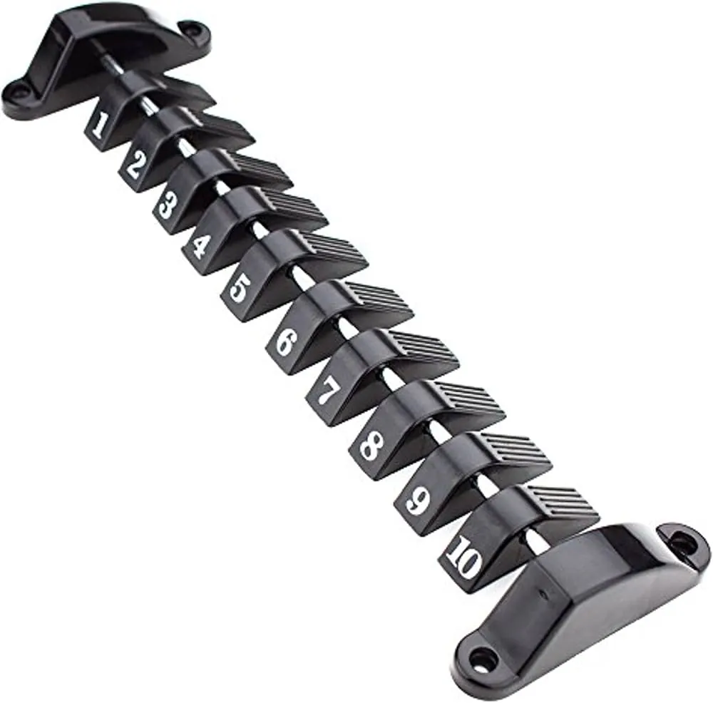 Measuring tape on foosball rod near lubricant and counter