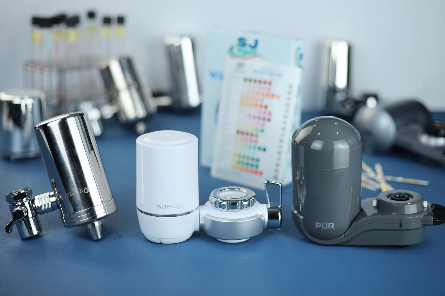 The metallic Culligan FM-15 water filter mounted securely on a kitchen faucet.