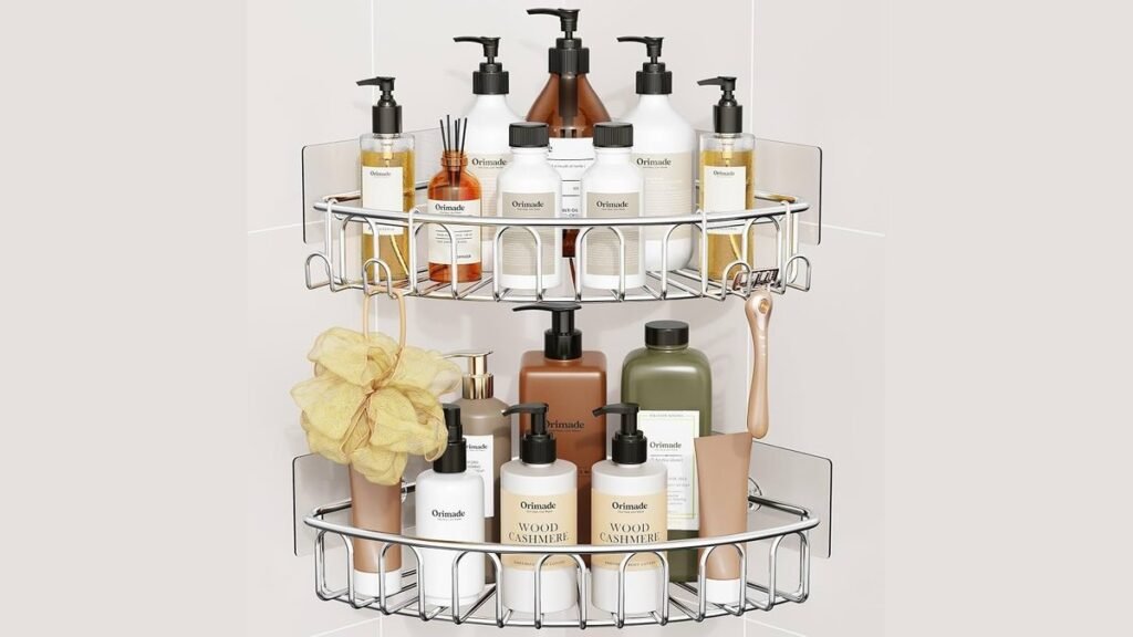 A modern bathroom shower featuring both a hanging shower caddy and corner shelf.