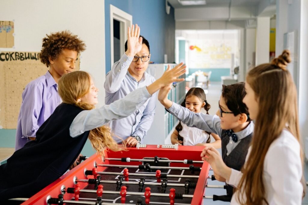 Modern foosball table in bright living room showing physical activity benefits