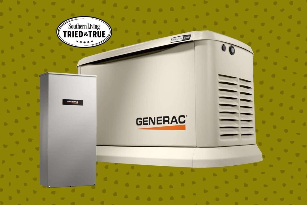 A modern home generator placed on a patio next to a house, surrounded by greenery