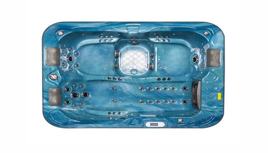 Modern hot tub jets activating unexpectedly in a serene backyard setting during twilight.