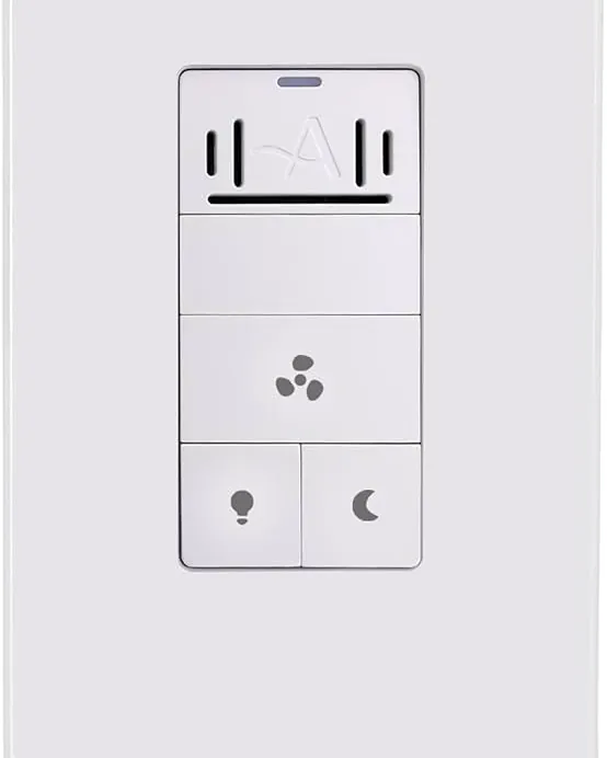 A modern humidity sensor switch with an adjustment dial mounted on a bathroom wall.