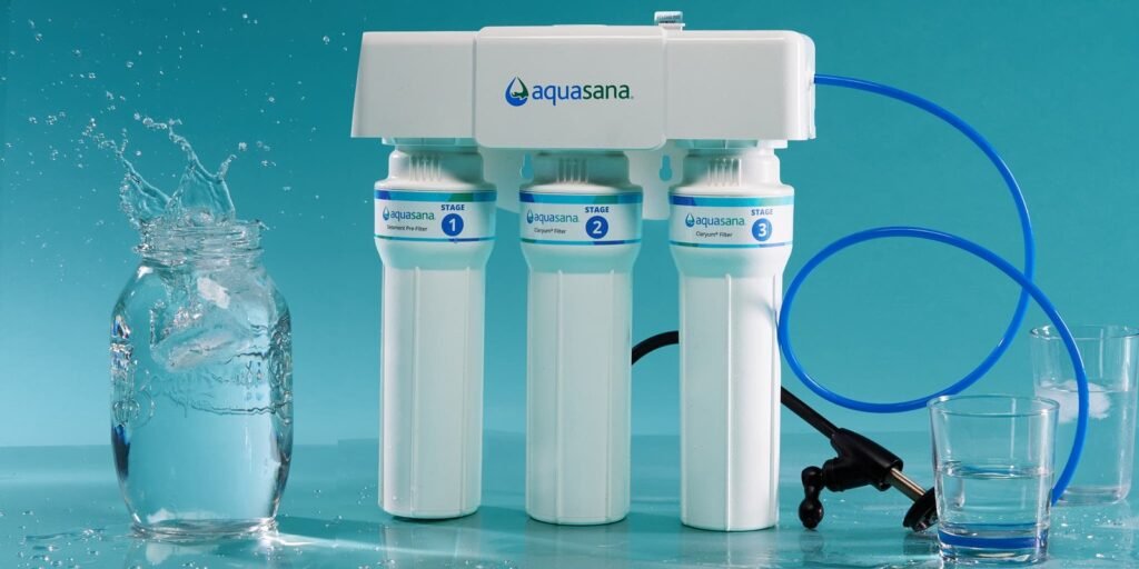 A modern kitchen setup showcasing a high-quality under-sink water filter installation.