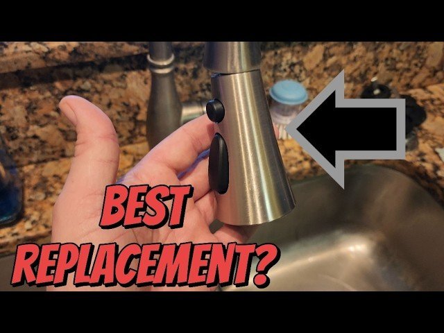 A modern stainless steel kitchen faucet with a pull down spray head.
