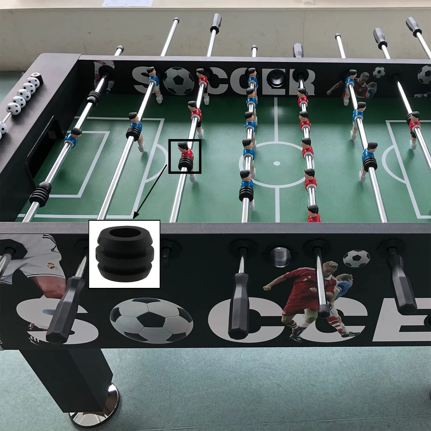 New and worn foosball bushings with lubricant on a desk