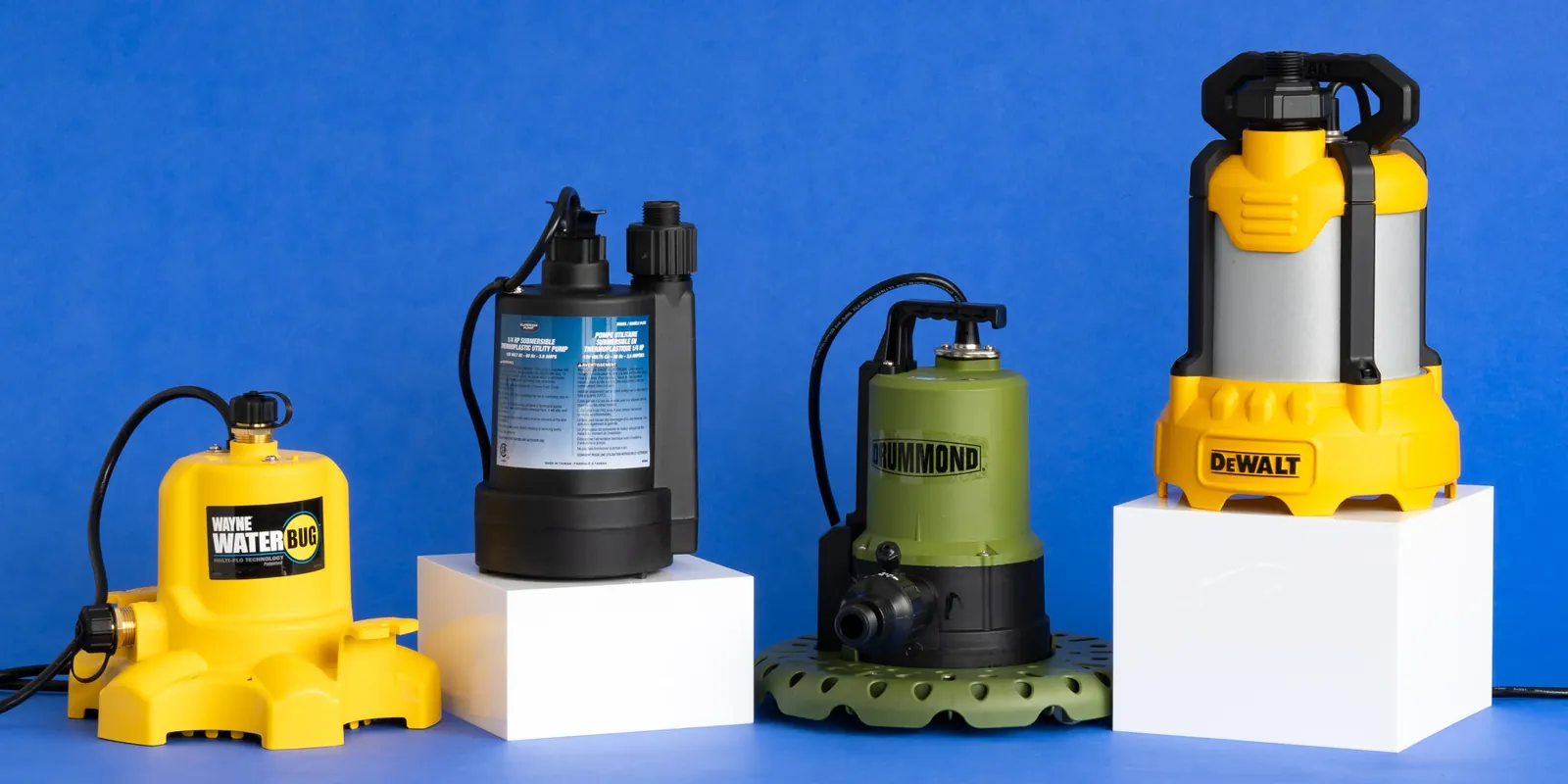 A pedestal utility pump mounted inside a sump pit with the motor raised.
