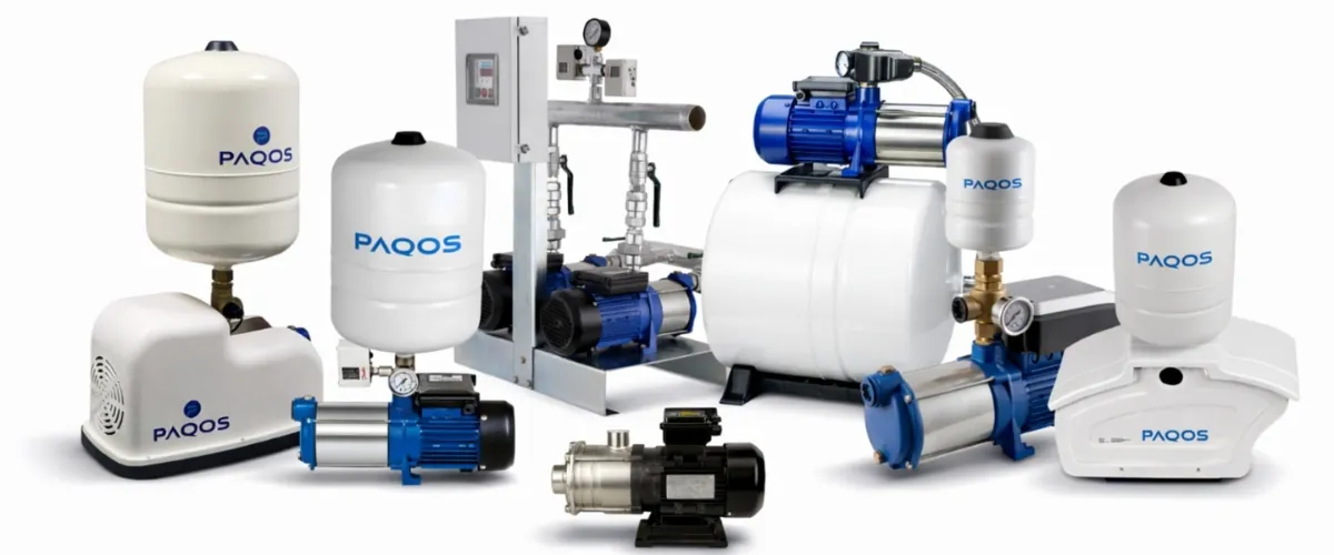 A person inspecting a water pressure gauge near a home booster pump system.