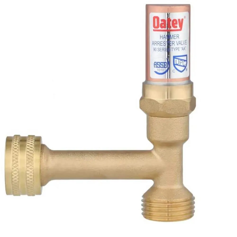 A plumber inspecting an in-line water hammer arrestor for a bathroom vanity installation.