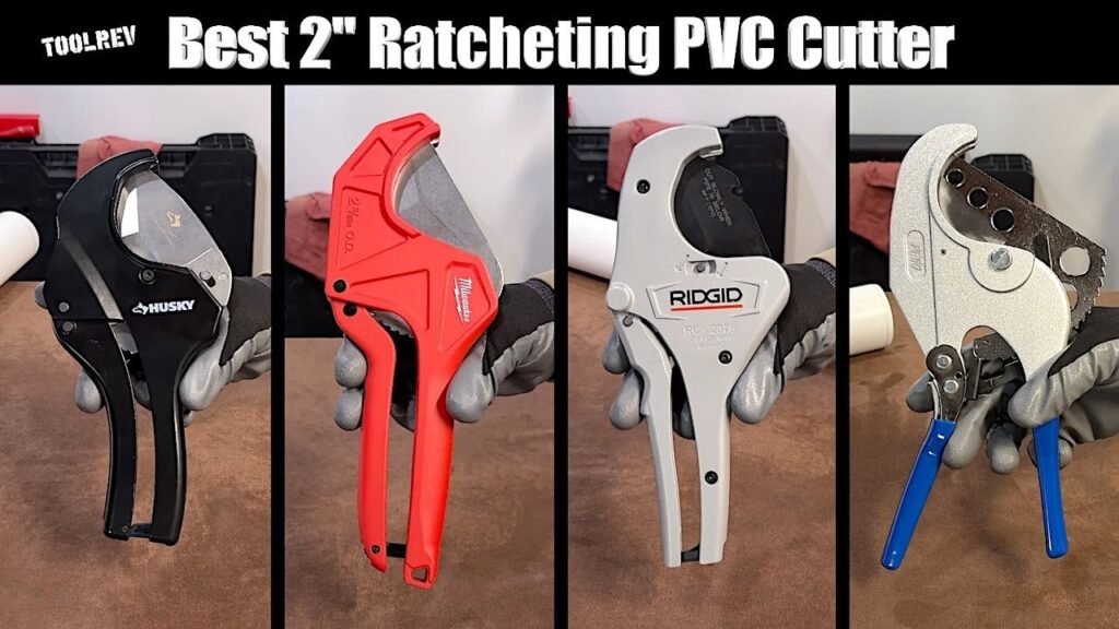 A professional assortment of various pipe cutters displayed on a clean workshop workbench.
