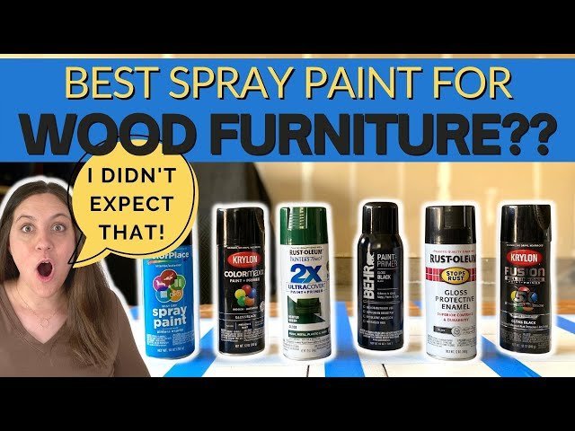 A professional spray paint can rests beside a beautifully painted wooden furniture piece.