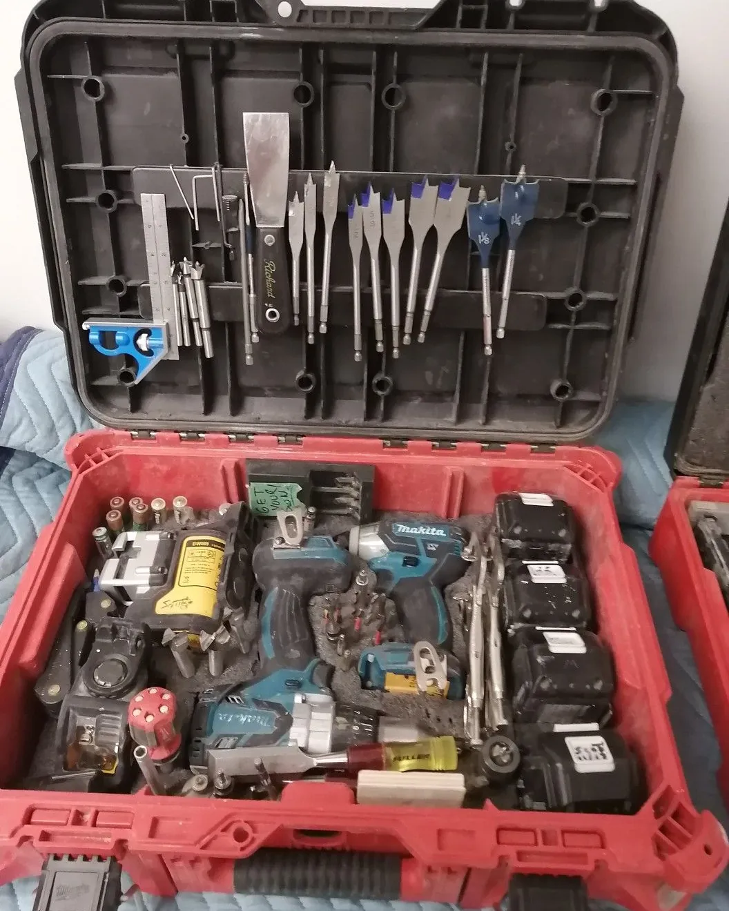 Rows of professional plumbing equipment displayed in a clean and organized hardware store.