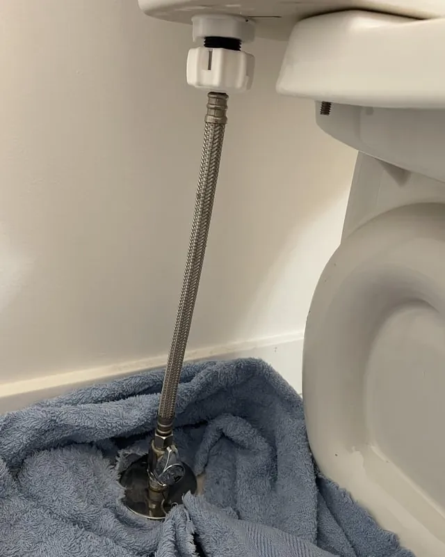 A secure, code-compliant plumbing connection showing a shut-off valve and supply line.