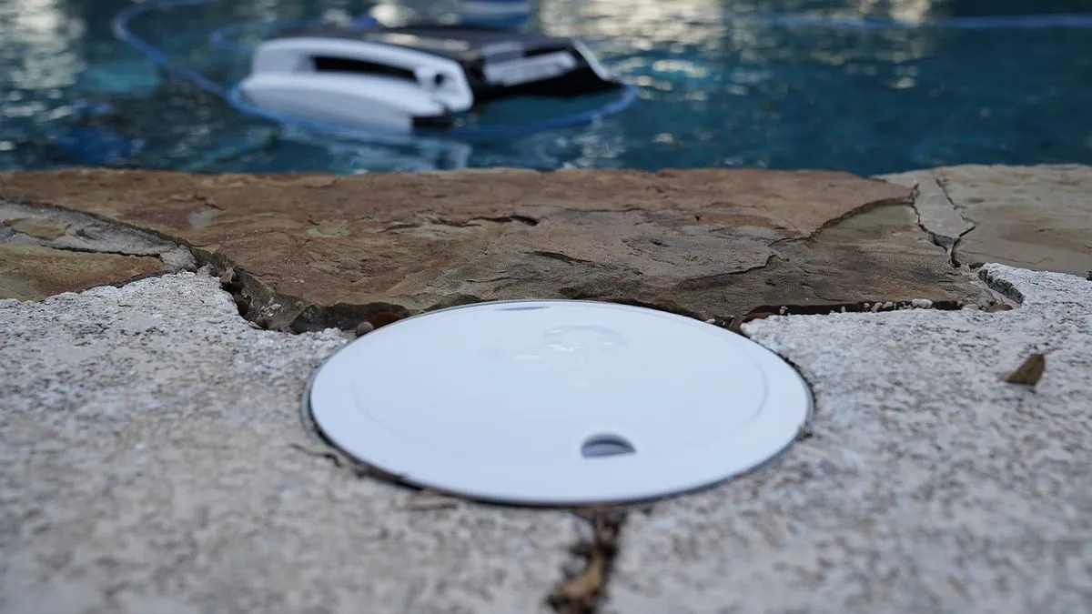 Side-by-side comparison of WaterGuru and Sutro sensors on a pool deck