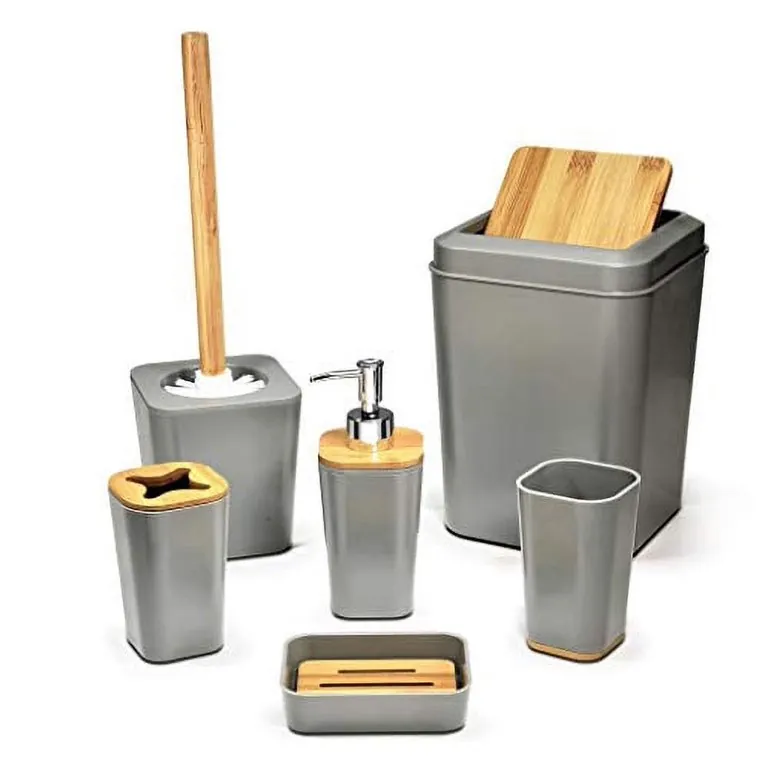 Stainless steel and bamboo bathroom accessories displayed side by side for a material comparison.