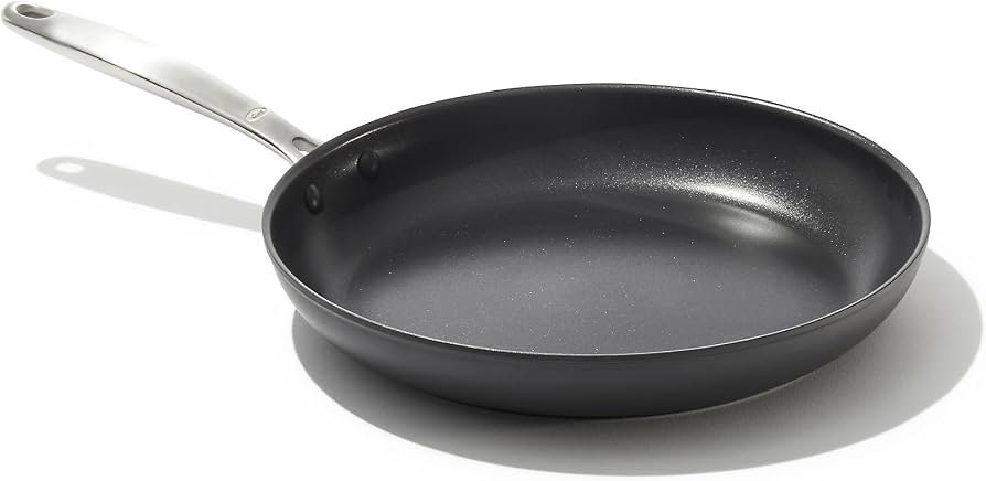 Stainless steel saucepan on a kitchen counter under soft natural light