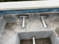 Strategic in ground spa jet placement layout visible in empty spa shell