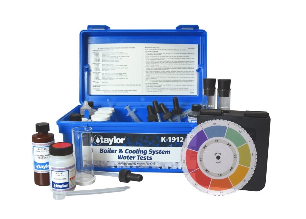 Taylor K-2006 and K-2006C pool water testing kits displayed side by side on a counter.