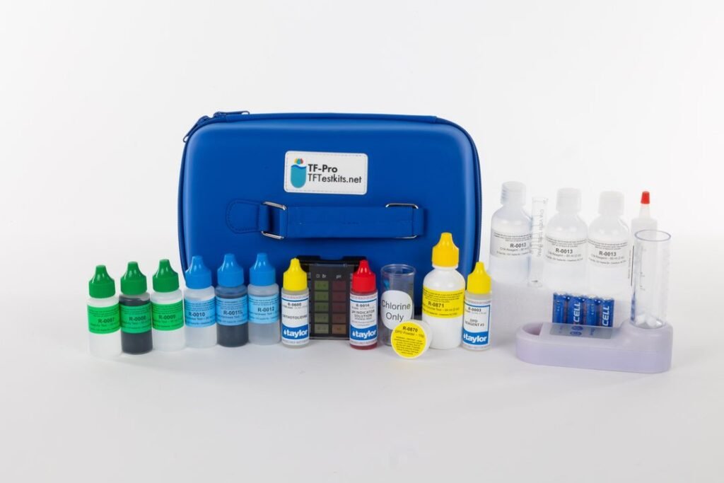 Taylor TF 100 and TF Pro pool test kits displayed side by side on a clean lab bench