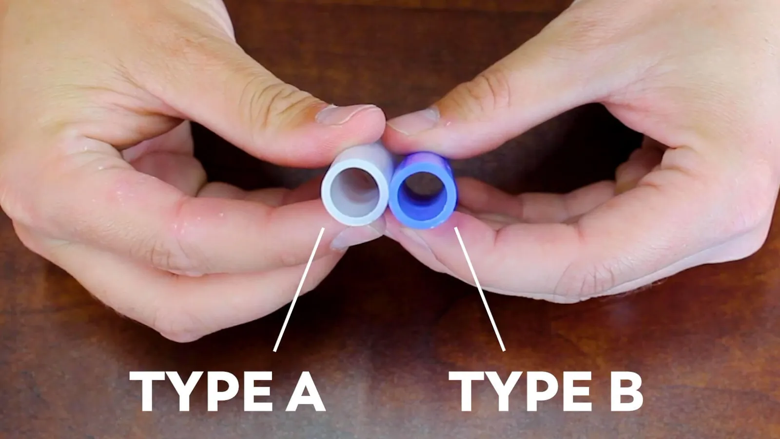 Two distinct types of PEX tubing laid out for a side-by-side technical comparison.