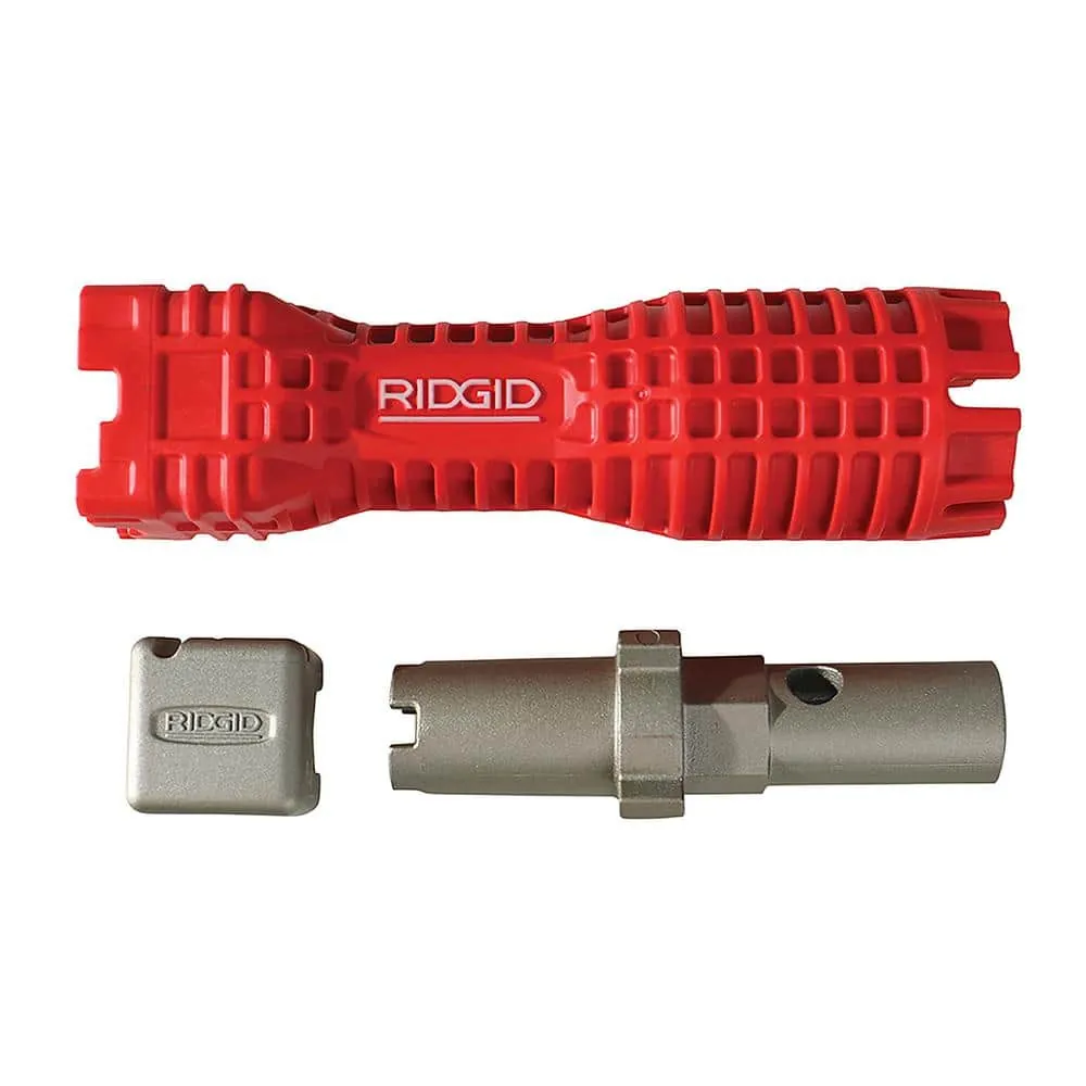 Various Ridgid plumbing tools arranged neatly for a side-by-side comparison on concrete.