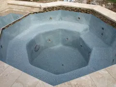 Weak spray from one spa jet indicating common maintenance problems and fixes