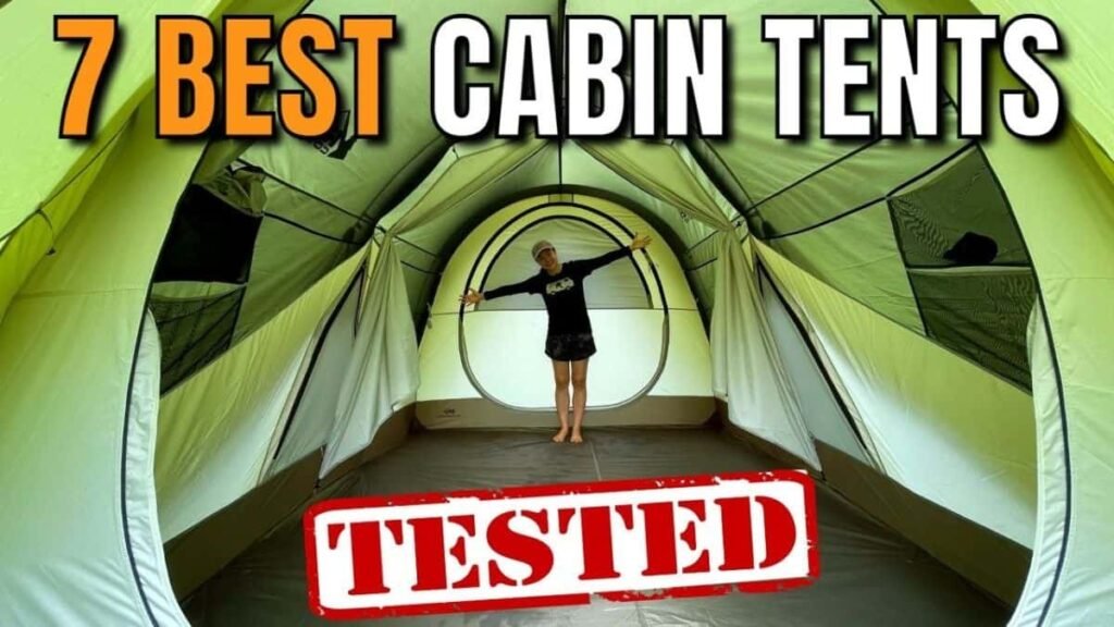 A weatherproof cabin tent standing firm in a rainy forest clearing at dawn