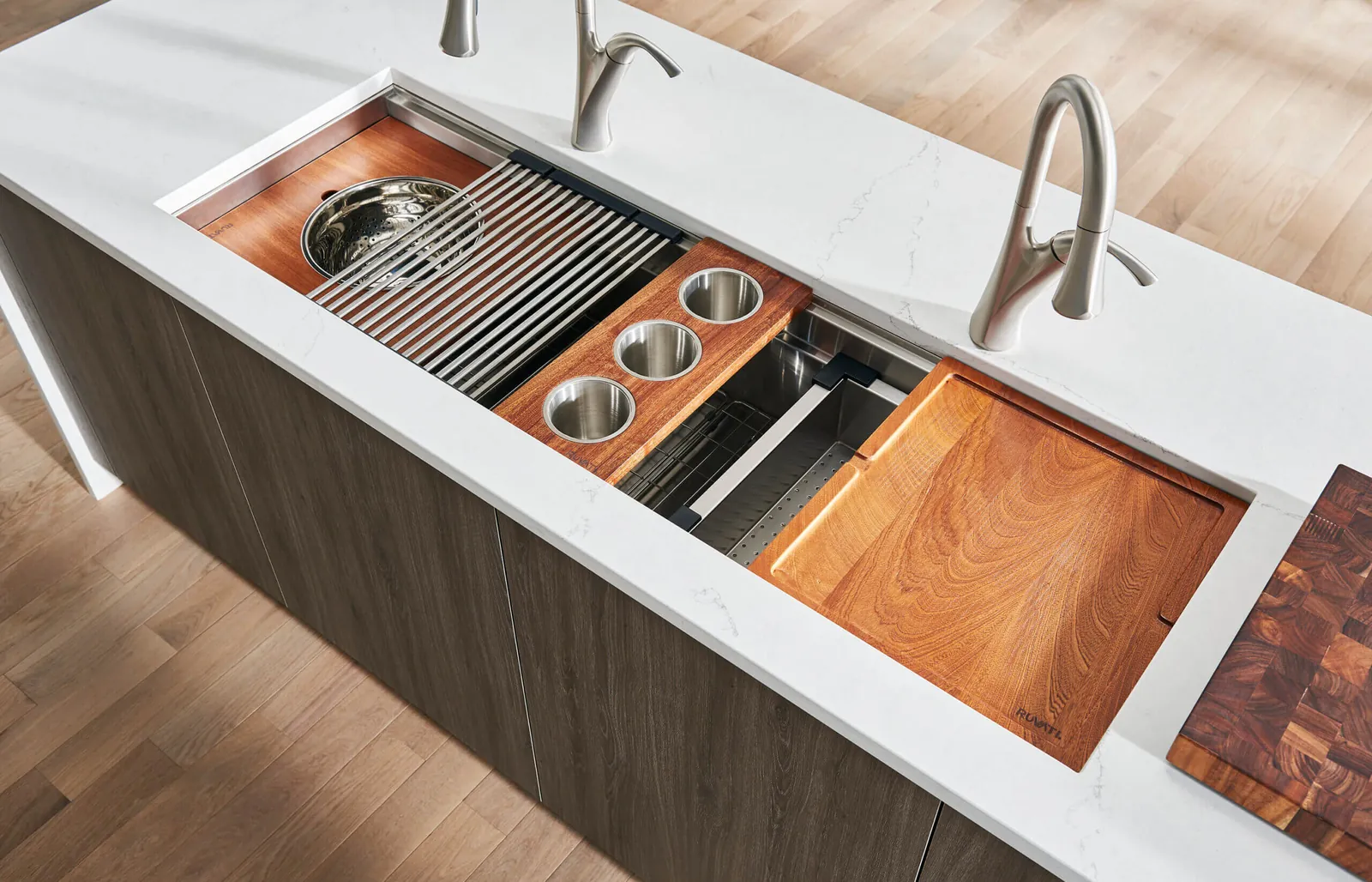 A white enameled cast iron kitchen sink showing its durable and glossy surface.