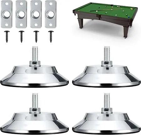 Wooden shim placed under foosball table foot on uneven carpet floor